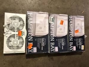 lot 32 image: Lot of Hampton Bay 9 in. Twin Window Fan   Customer Returns See Pictures