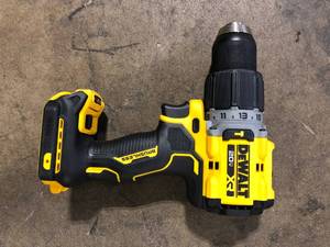 lot 34 image: DEWALT 20V Compact Cordless 12 in. Hammer Drill (Tool Only) Customer Returns See Pictures