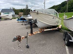 lot 5 image: 1968 18ft Starcraft Boat and Trailer
