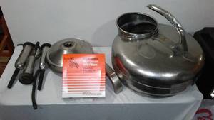 lot 831 image: The Surge Milker And Milk Filters. Babson Bros. Co.