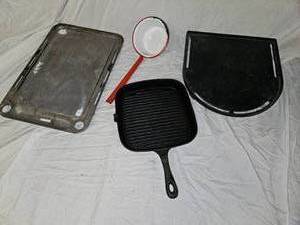 lot 842 image: Cast Iron 9 Inch Grill Skillet and Enamelware Ladle Dipper Scoop.