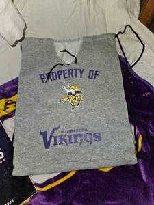 lot 492 image: Minnesota Vikings Memorabilia.