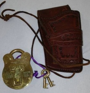 lot 301 image: Jared Brass Lock And Leather Holster