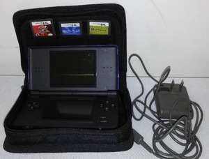 lot 313 image: Nintendo Ds Lite W Games.