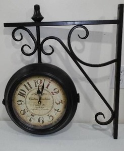 lot 314 image: Double Sided Wall Mount Station Style Clock.