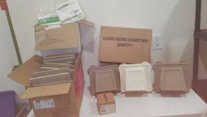 lot 897 image: Hooded Exhaust Vents (New) And More.
