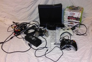 lot 941 image: Xbox 360 Counsel, Games, and Accessories.