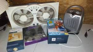 lot 553 image: Window Fan, Lasko Heater, Body Ball, Slippies
