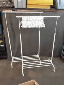 lot 44 image: 2 adjustable height rolling garment racks