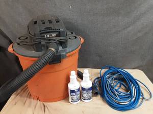 lot 69 image: Rigid 5.0HP shop vac, Extension cord and 2 bottles of OvenGrillFryer Cleaner