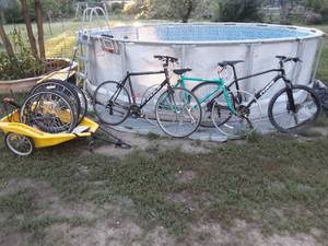lot 79 image: Bikes, Bike trailer, and bike parts