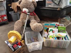 lot 95 image: Toys, books, blower for bounce house