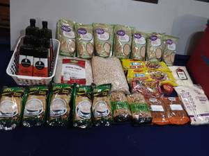 lot 20 image: Assortment of unopened shelf-stable foods (some past the best by date)