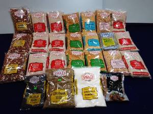 lot 21 image: Assortment of unopened shelf-stable foods (some past the best by date)