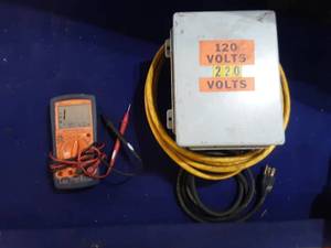 lot 24 image: Actron cp7677 Auto troubleshooter multimeter and 120 volt 220 volt AC converter