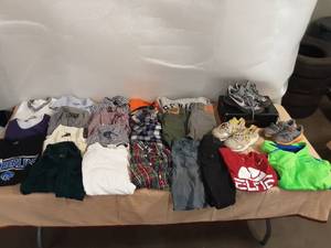 lot 30 image: Youth boys clothes size 6-7 and 3 pair Nike shoes
