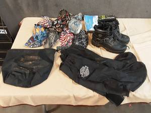 lot 35 image: Womans Harley boots size 8, rain boot covers, skull caps,