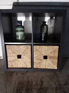 lot 129 image: Ikea four cubby shelf with 2 baskets and 2 vases