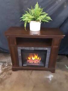 lot 130 image: electric Fireplace Heater wremote and faux plant