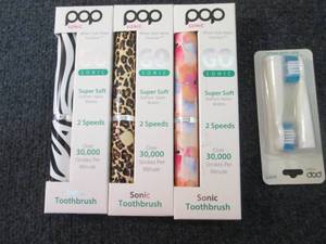 lot 297 image: 3 Pop Sonic Toothbrushes with Extra...