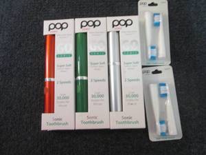 lot 298 image: 3 Pop Sonic Toothbrushes with Extra...