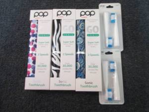 lot 299 image: 3 Pop Sonic Toothbrushes with Extra...