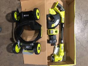 RYOBI ONE 18V 12 in. Cordless Mower with 4.0 Ah Battery and Charger  Customer Returns See Pictures