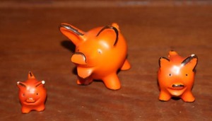 lot 33 image: (3) Rare Find... Goebel West Germany 1950-60s Miniature Orange Pig Family Hand-Painted Porcelain