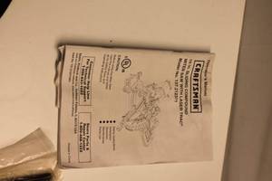 lot B-24 image: Craftsman 10-inch Sliding Compound Miter Saw with Laser Trac Model 137.212371