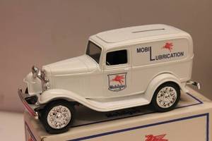 lot 49 image: Lot of 4 Die-Cast Metal Vintage Gasoline Tanker Coin Banks