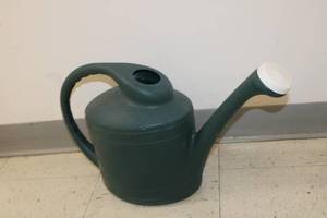 lot 108 image: Green Plastic Watering Can