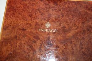 lot 153 image: Faberg Wood and Leather Jewelry Box with Key