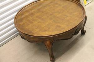 lot B-65 image: Vintage Round Wood Coffee Table with Carved Detail