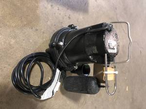 lot 23 image: Everbilt 12HP Cast Iron Sump Pump  Customer Returns See Pictures