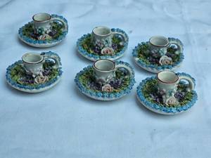 lot 44 image: Antique Elfinware Candle Stands