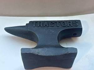 lot 20 image: Farmall Tractor Metal Anvil 4 12 Wide