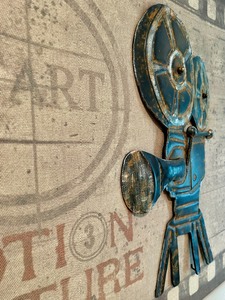 lot 109 image: Whimsical Movie Pictures Wall Decor with Metal Accents