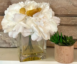 lot 53 image: Elegant Home Decor, Including Candles and Faux Flowers  Plant