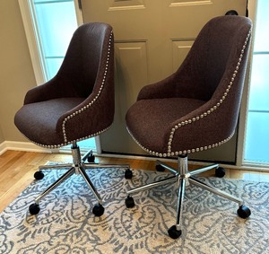lot 34 image: Two Charming Chairs with Rivet Details on Casters