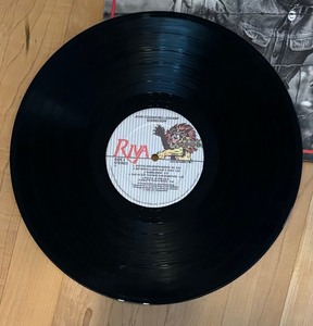 lot 145 image: Two John Cougar Mellencamp Record Albums