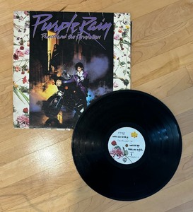 lot 148 image: Prince Record Albums and Book including Prince Purple Rain Record Album