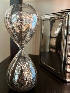 lot 43 image: Silver Decor, Including Faux Books and Sand Timer