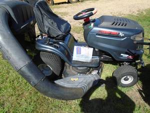 Troy Bilt 22 hp riding lawn mower. Starts fast. Runs & drives as it should. As shown.