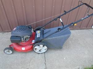 Yard Machine 21� high wheel mower push mower. Good used condition. Tested & works. As shown.