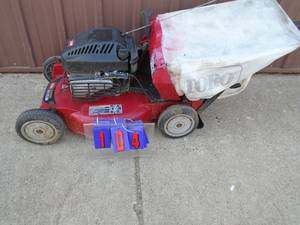 Toro personal pace recylcer lawn mower. Good used condition. Tested & works. As shown.