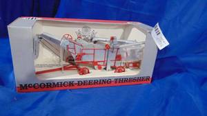lot 11 image: New in Box McCormick Deering Thresher 128 Scale by Spec Cast