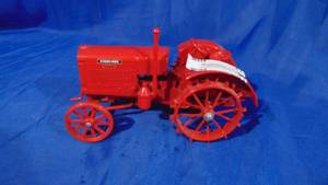 lot 34 image: McCormick-Deering 22-36 116 Scale Tractor by Scale Models