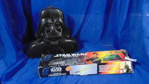 lot 49 image: Star Wars Lightsaber and Darth Vader Figure Case