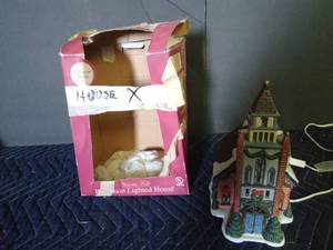 lot 28 image: Victoria Falls Porcelain lighted house