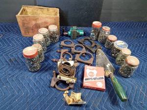lot 49 image: Vise, Wood box of muffler clamps jatrs of screws bolts and nuts